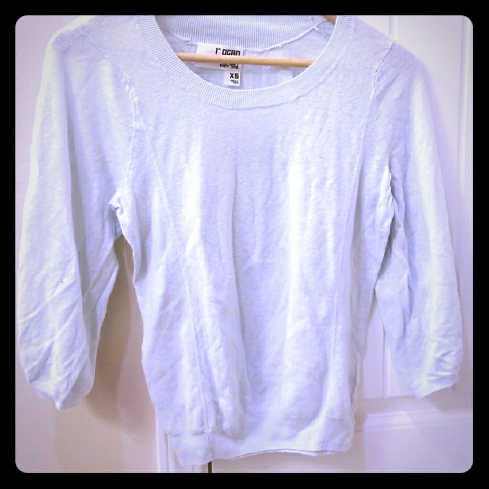 Light blue blouse.